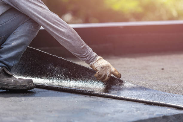 Professional Interior Drainage System technician working in Cedarhurst, NY